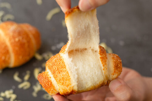 bread-secret-tearing-a-cheesy-salted-butter-roll
